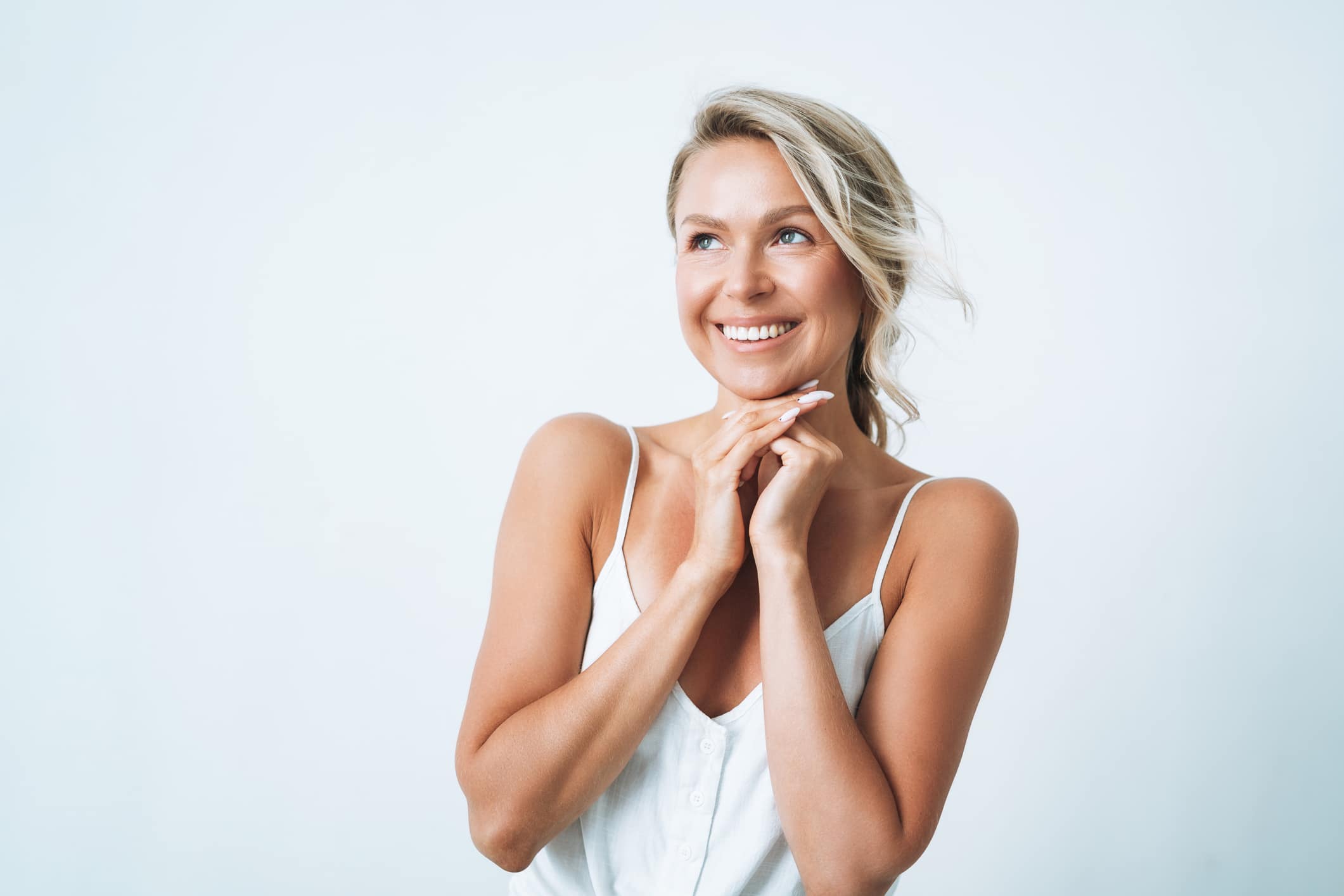 Beauty portrait of blonde hair emotional young woman isolated on white background